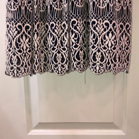 A navy dress w/ white embroidery and a sheer back - Picture 5 of 5